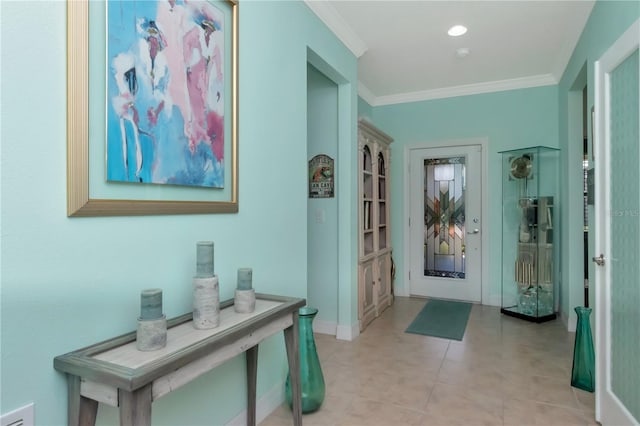 entrance foyer featuring crown molding