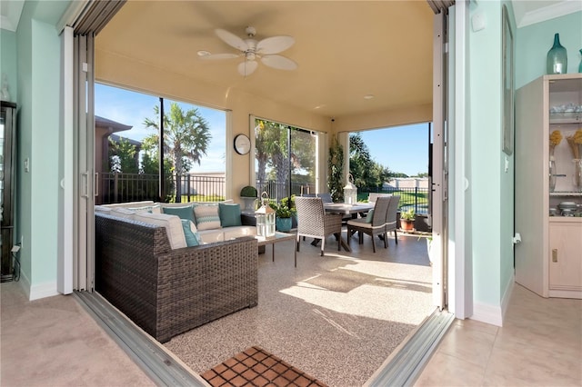 exterior space with ceiling fan