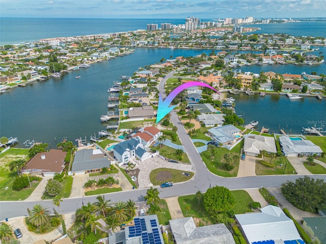 birds eye view of property featuring a water view