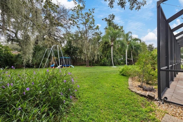 view of yard featuring a playground