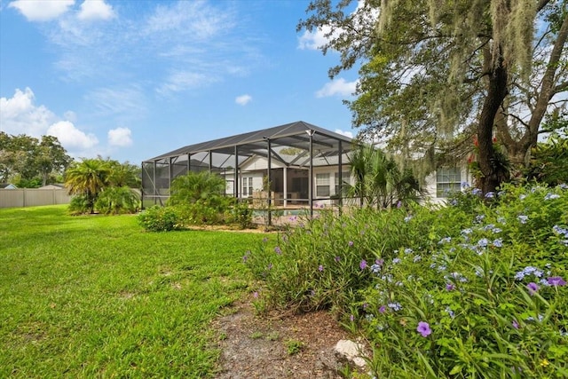 view of yard with a lanai