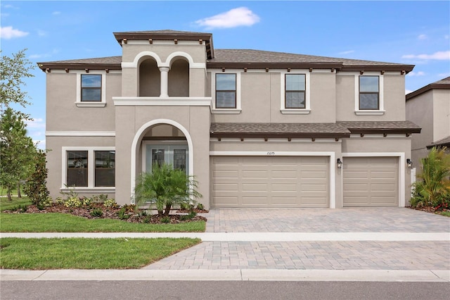 view of front of property with a garage