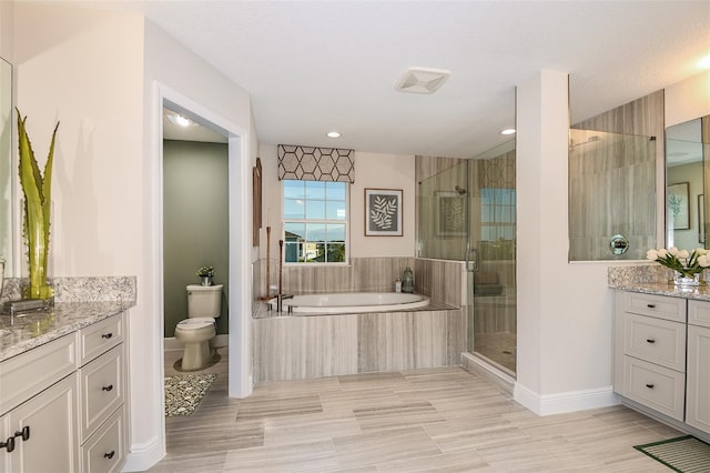 full bathroom featuring vanity, toilet, a textured ceiling, and plus walk in shower