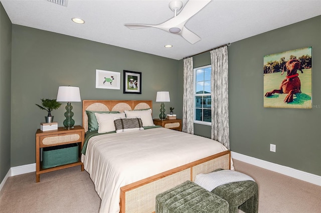 carpeted bedroom with ceiling fan