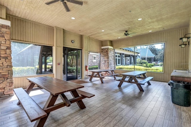 interior space featuring ceiling fan