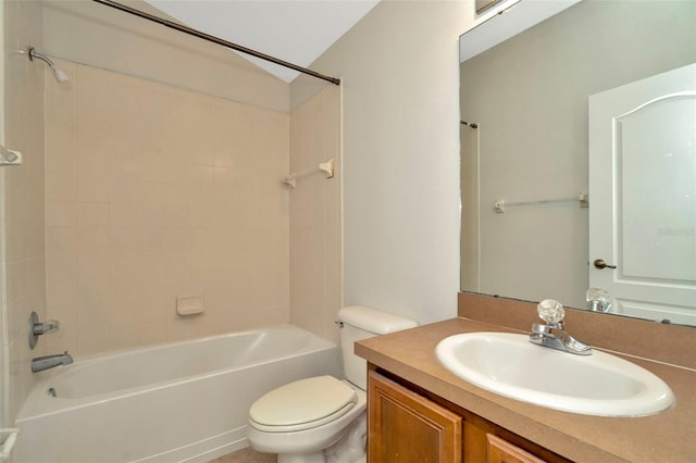 full bathroom with vanity, toilet, and tiled shower / bath combo