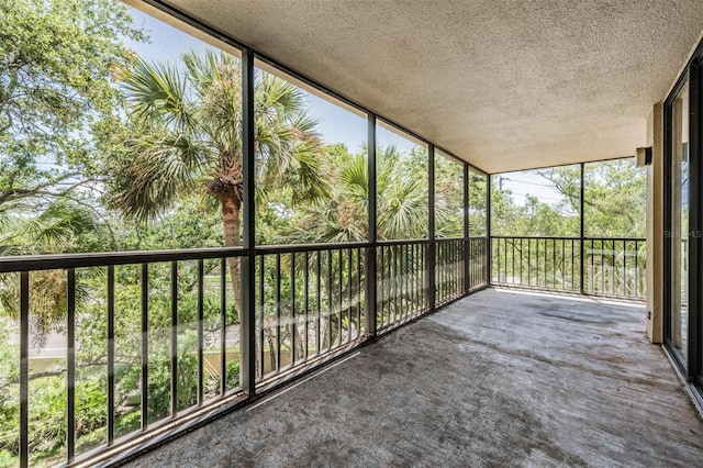 unfurnished sunroom featuring a wealth of natural light