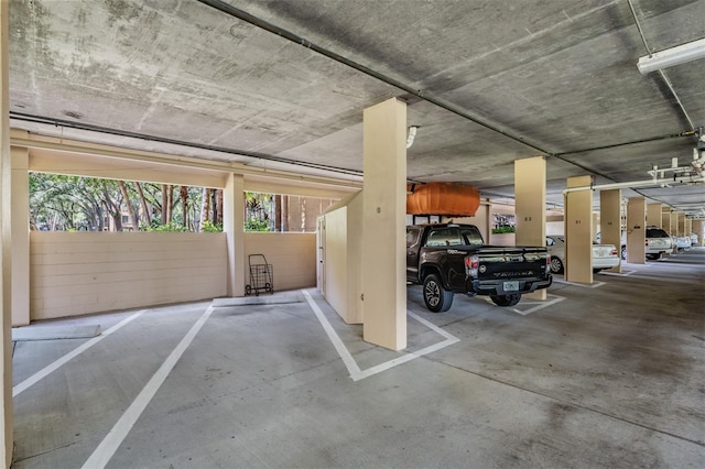 garage featuring a carport