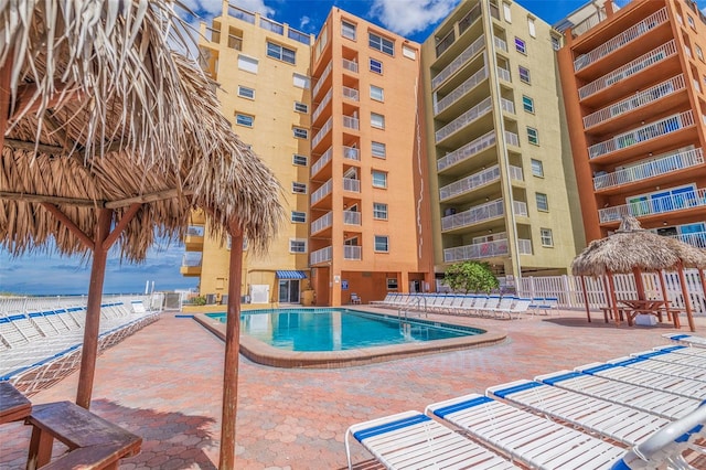 view of pool featuring a patio area