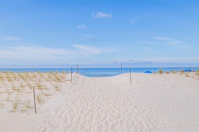 view of water feature with a beach view