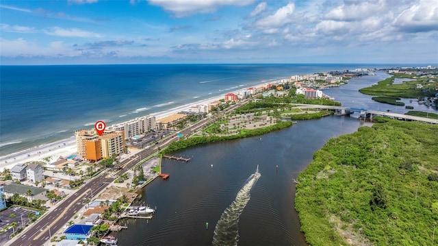 drone / aerial view with a view of the beach and a water view