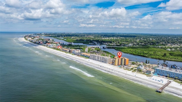 aerial view with a view of the beach and a water view