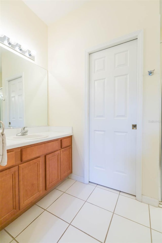 bathroom featuring vanity and tile patterned floors