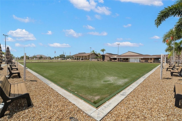 view of home's community featuring a lawn