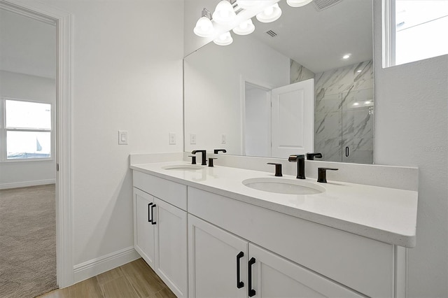 bathroom featuring vanity and walk in shower