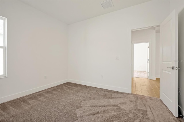 view of carpeted spare room