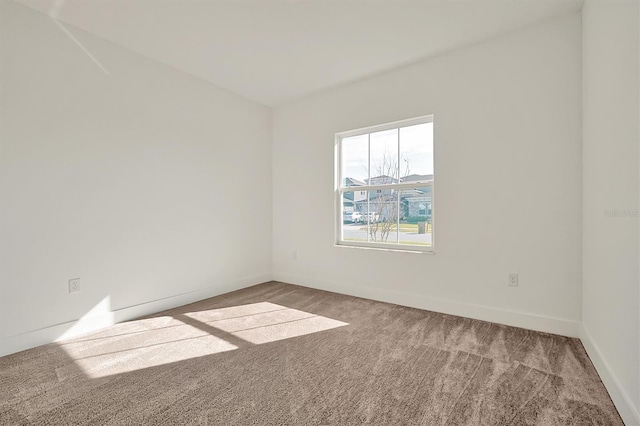 empty room with carpet floors