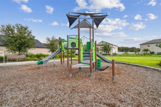 view of play area featuring a lawn