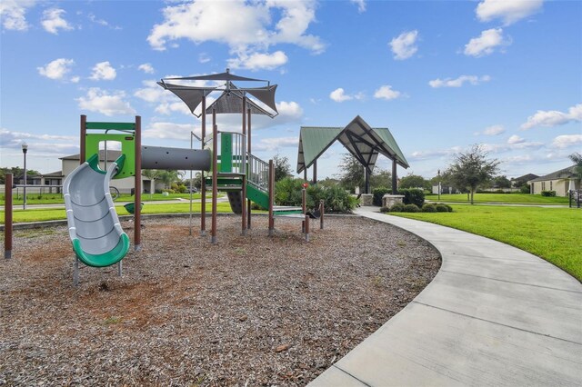 view of play area featuring a yard