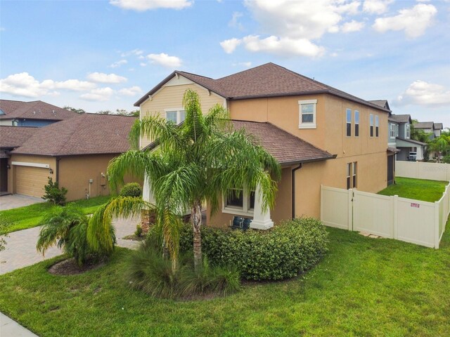 view of home's exterior featuring a lawn