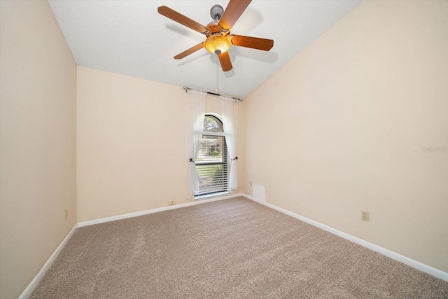 unfurnished room with ceiling fan and carpet flooring