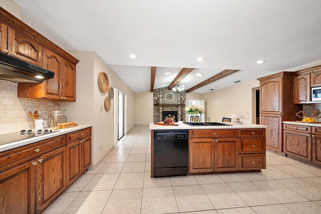 kitchen featuring light tile patterned floors, stainless steel microwave, decorative backsplash, a fireplace, and dishwasher