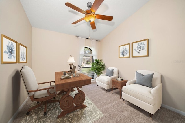 carpeted office space with ceiling fan and lofted ceiling