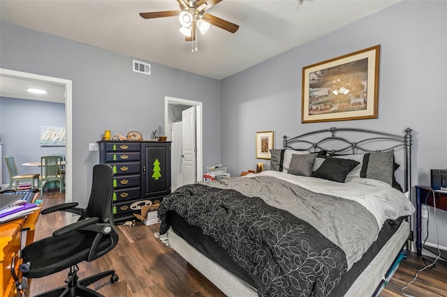 bedroom featuring ceiling fan and dark hardwood / wood-style floors