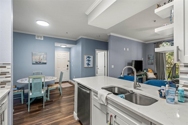 kitchen with white cabinets, ornamental molding, dishwasher, and light stone counters