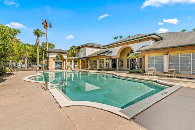 view of pool featuring a patio