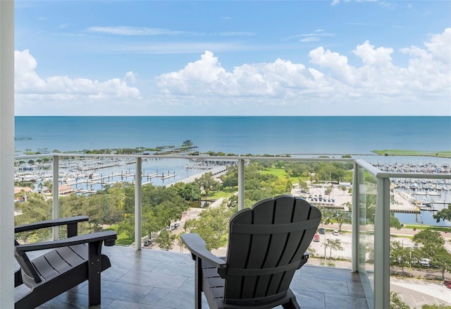 balcony featuring a water view