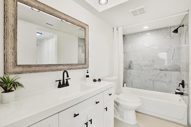 full bathroom featuring shower / tub combo, tile patterned floors, vanity, and toilet