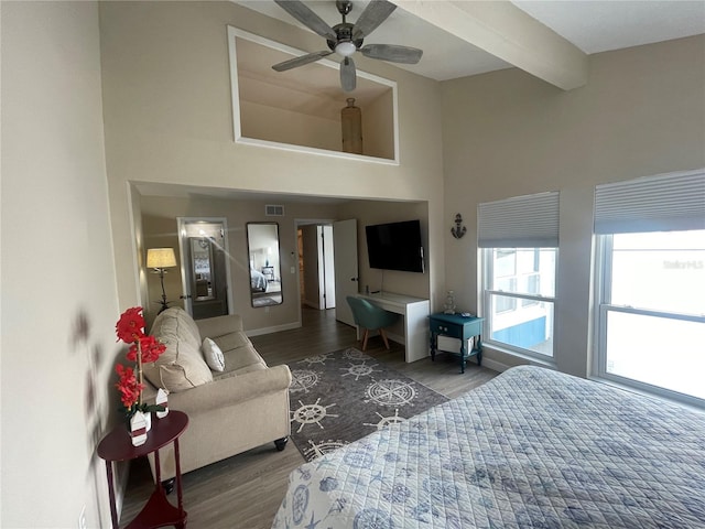 bedroom featuring ceiling fan and dark hardwood / wood-style flooring