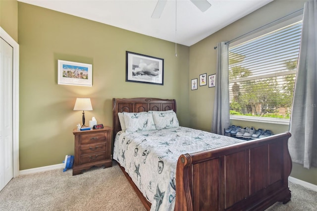 carpeted bedroom with ceiling fan