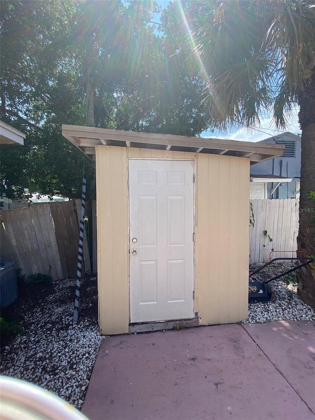 view of outbuilding with central AC