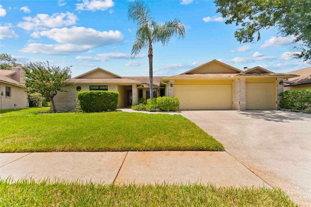 ranch-style house featuring a garage and a front lawn