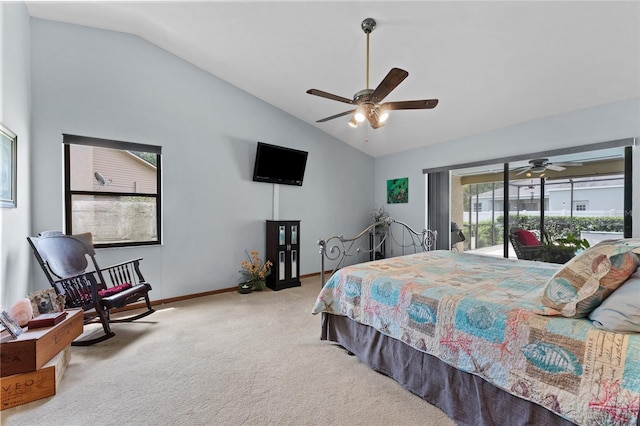 carpeted bedroom featuring vaulted ceiling, access to exterior, and ceiling fan