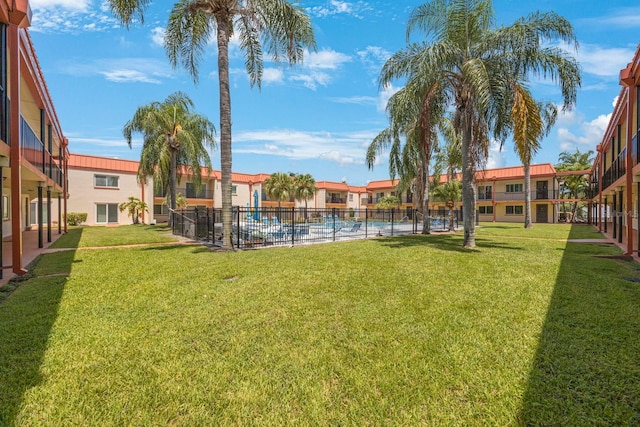 view of yard with a community pool