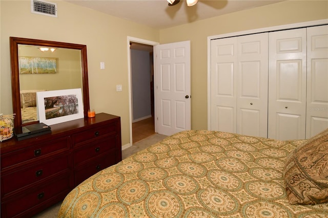 7519 Harbor View Way, Seminole, FL 33776 - bedroom with visible vents, a closet, and a ceiling fan