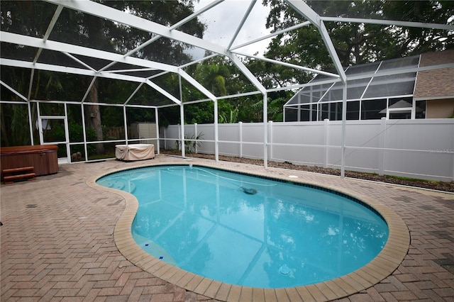 7519 Harbor View Way, Seminole, FL 33776 - view of swimming pool with a patio, a fenced backyard, an outdoor structure, and a hot tub