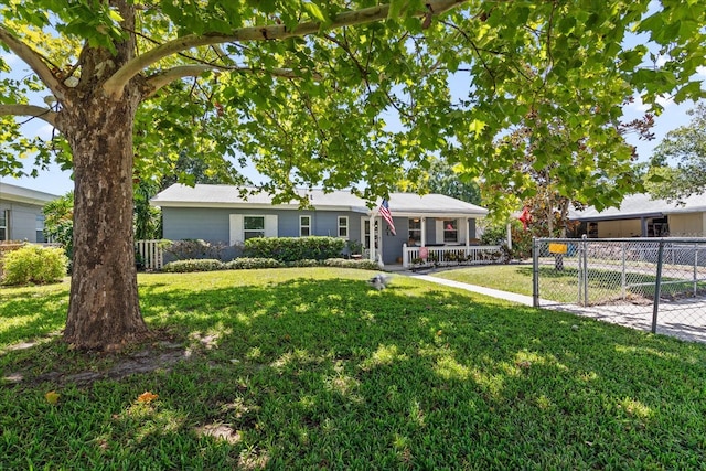 ranch-style house featuring a front yard