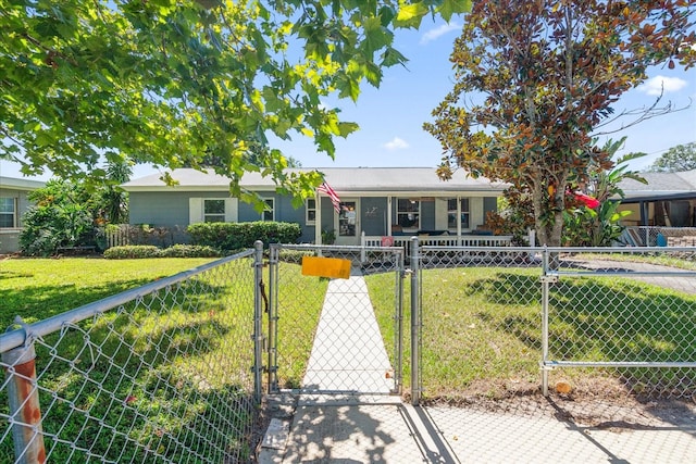 ranch-style home with a front lawn and a porch