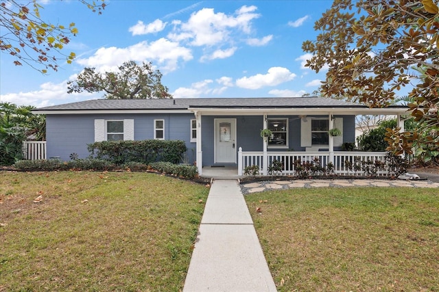 ranch-style house featuring a front yard