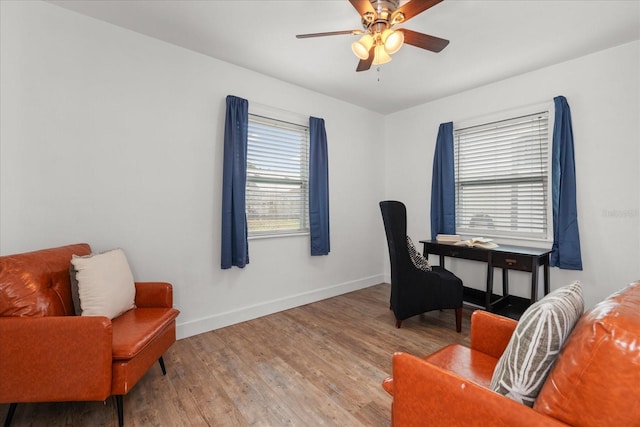 office area with ceiling fan and hardwood / wood-style flooring