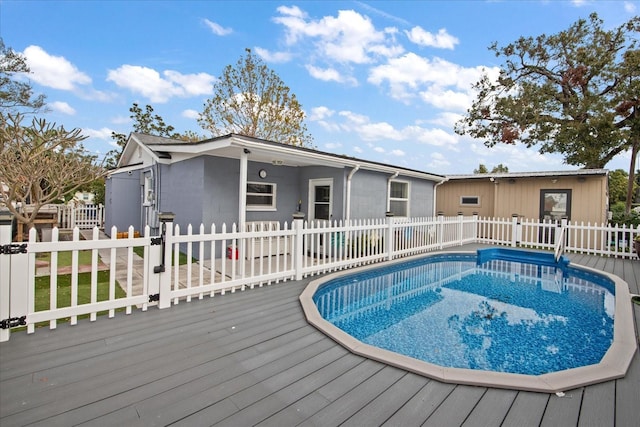 view of pool with a deck