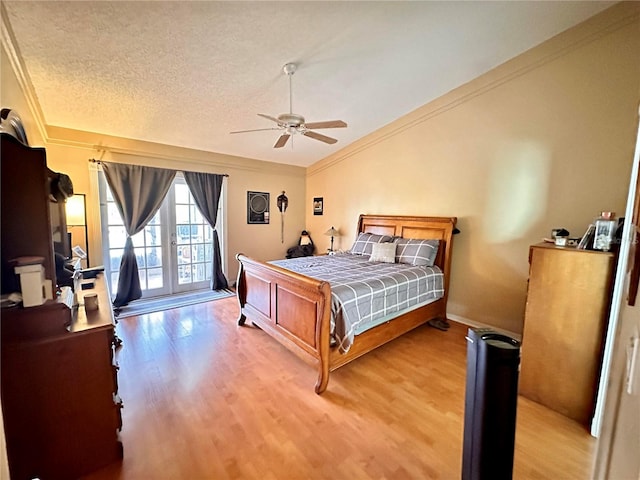 bedroom featuring access to outside, ceiling fan, light hardwood / wood-style flooring, and ornamental molding