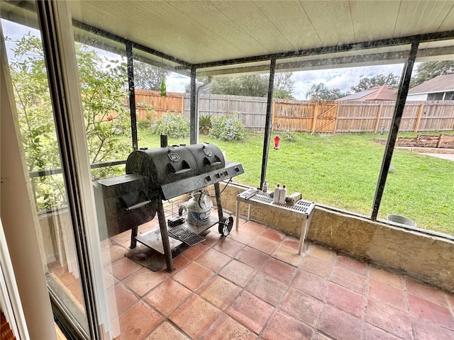 unfurnished sunroom featuring plenty of natural light