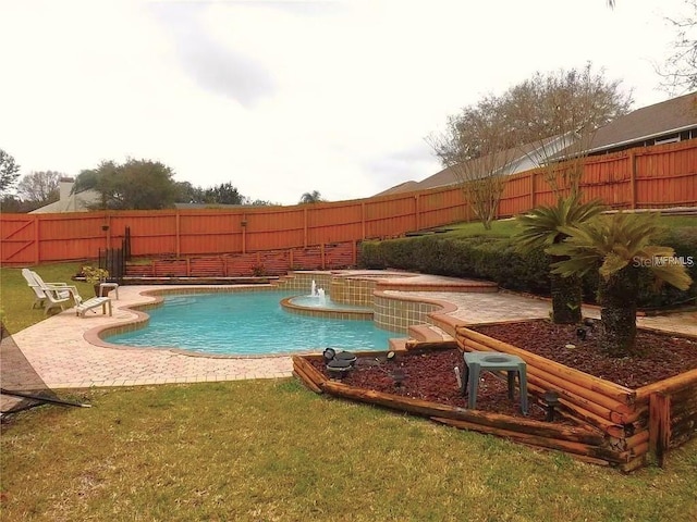 view of pool featuring a lawn and pool water feature