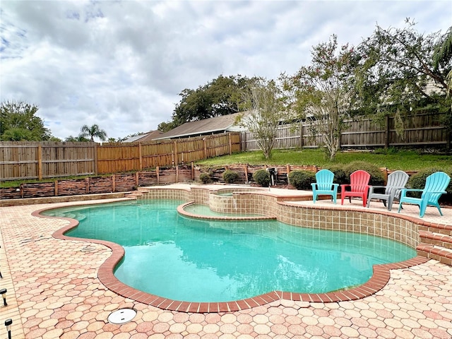 view of pool featuring a patio