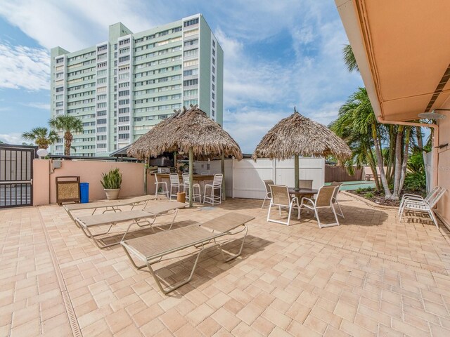 view of patio featuring a bar